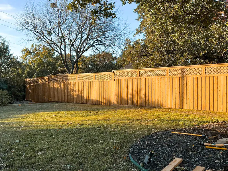 Cedar privacy fence with lattice top installed for a Fort Worth, TX home